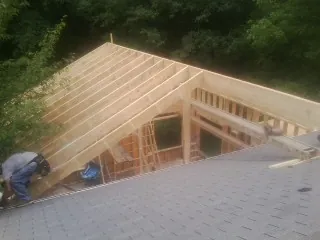 Framing a new roof addition that ties into an existing shingle roof in Lynnwood
