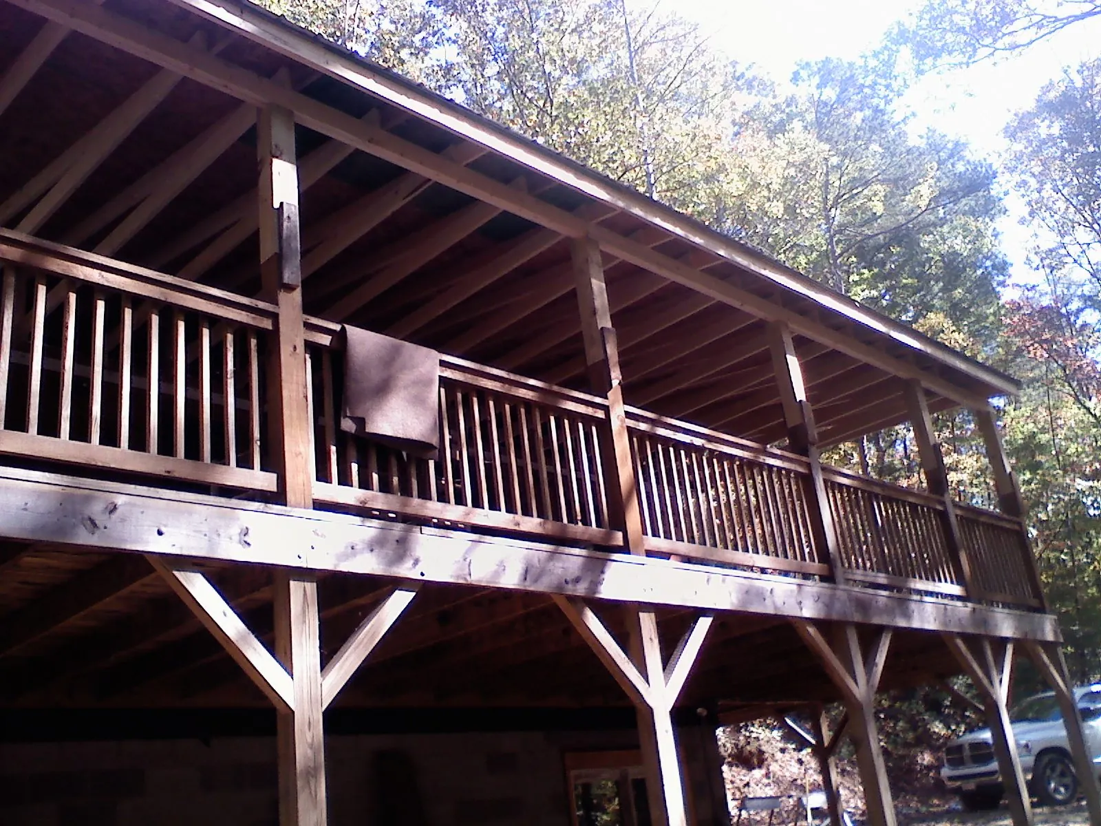 Timber framing under a new elevated porch and deck — Roof Leak Repair in Lynnwood by Roofing Brothers